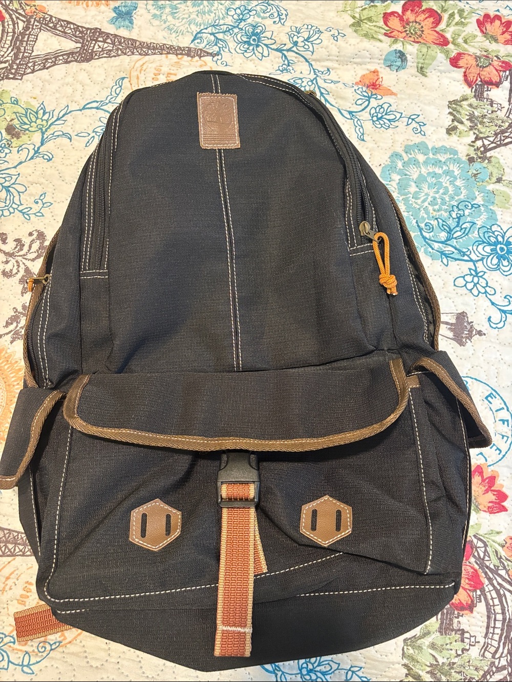 Timberland Black Canvas Backpack with Brown Trim and Orange Pull